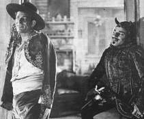 Lon Chaney y John George en THE UNKNOWN